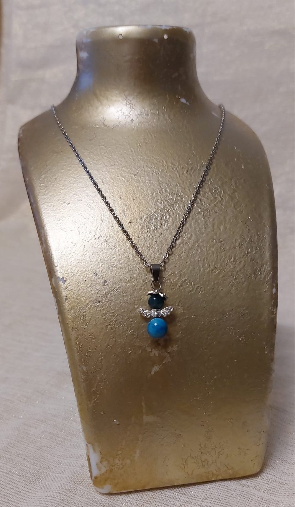 2025/06/1000045607-scaled.jpg collier ange en apatite sur acier inoxydable