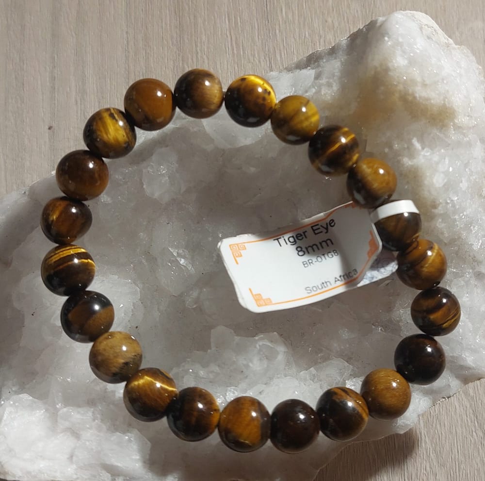 2024/08/1000038448-scaled.jpg Bracelet Oeil de Tigre perles 8mm