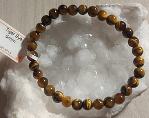 2024/08/1000038446-scaled.jpg Bracelet Oeil de Tigre perles 6mm